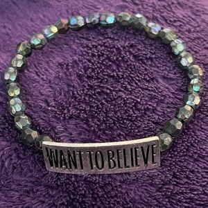 Want To Believe bracelet with metallic colored beads. Stretchy. EUC.